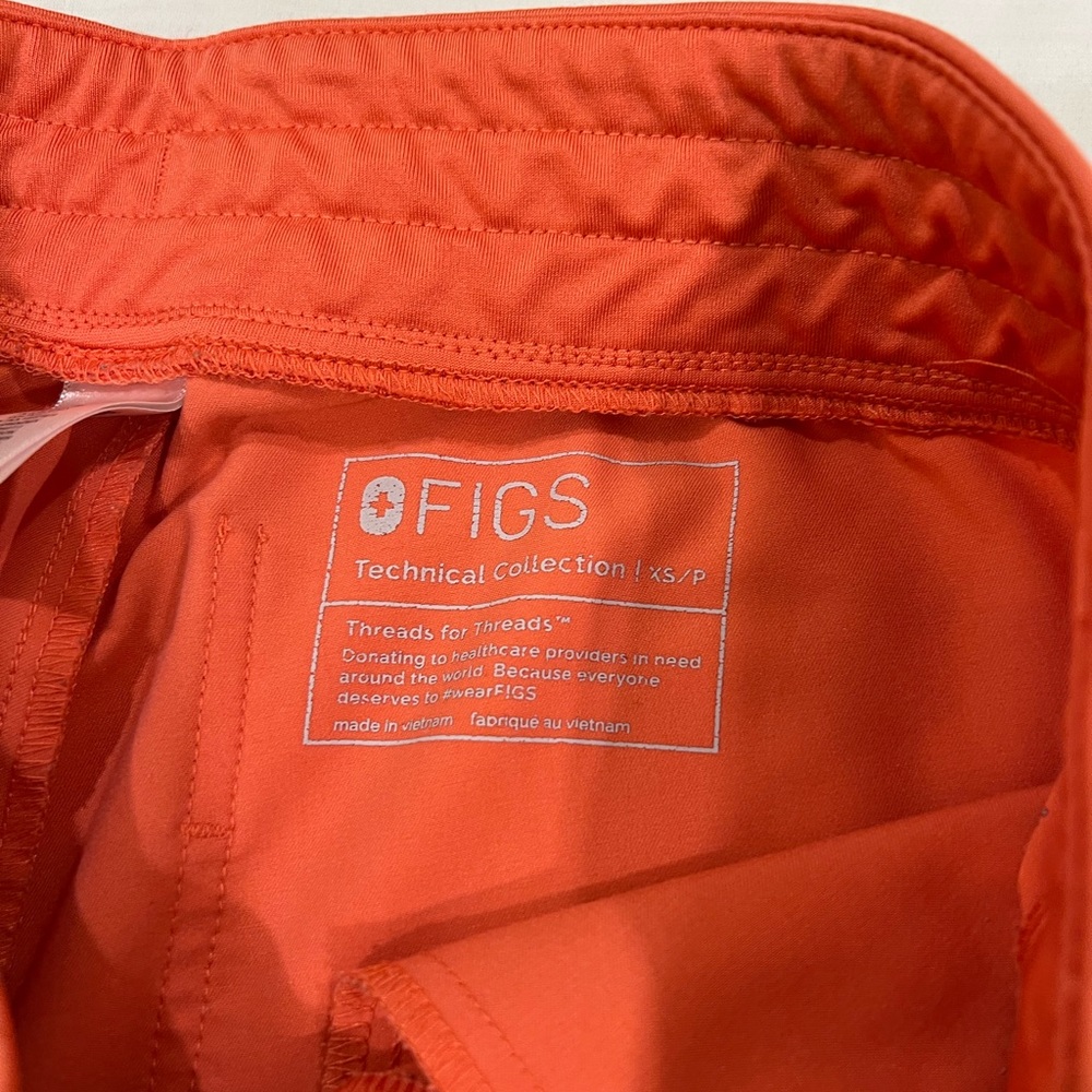 Wear figs Zamora Jogger scrub pants. Size XS/P. Color: hot coral